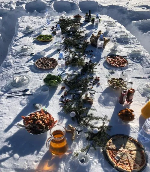 Lunch being served in the snow for lots of guests